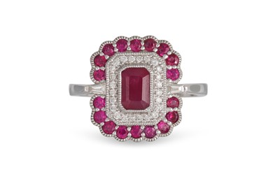 Lot 42 - A DIAMOND AND RUBY CLUSTER RING, of...