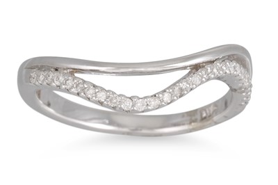 Lot 14 - A DIAMOND SET BAND, in wavy form, in 9ct gold....