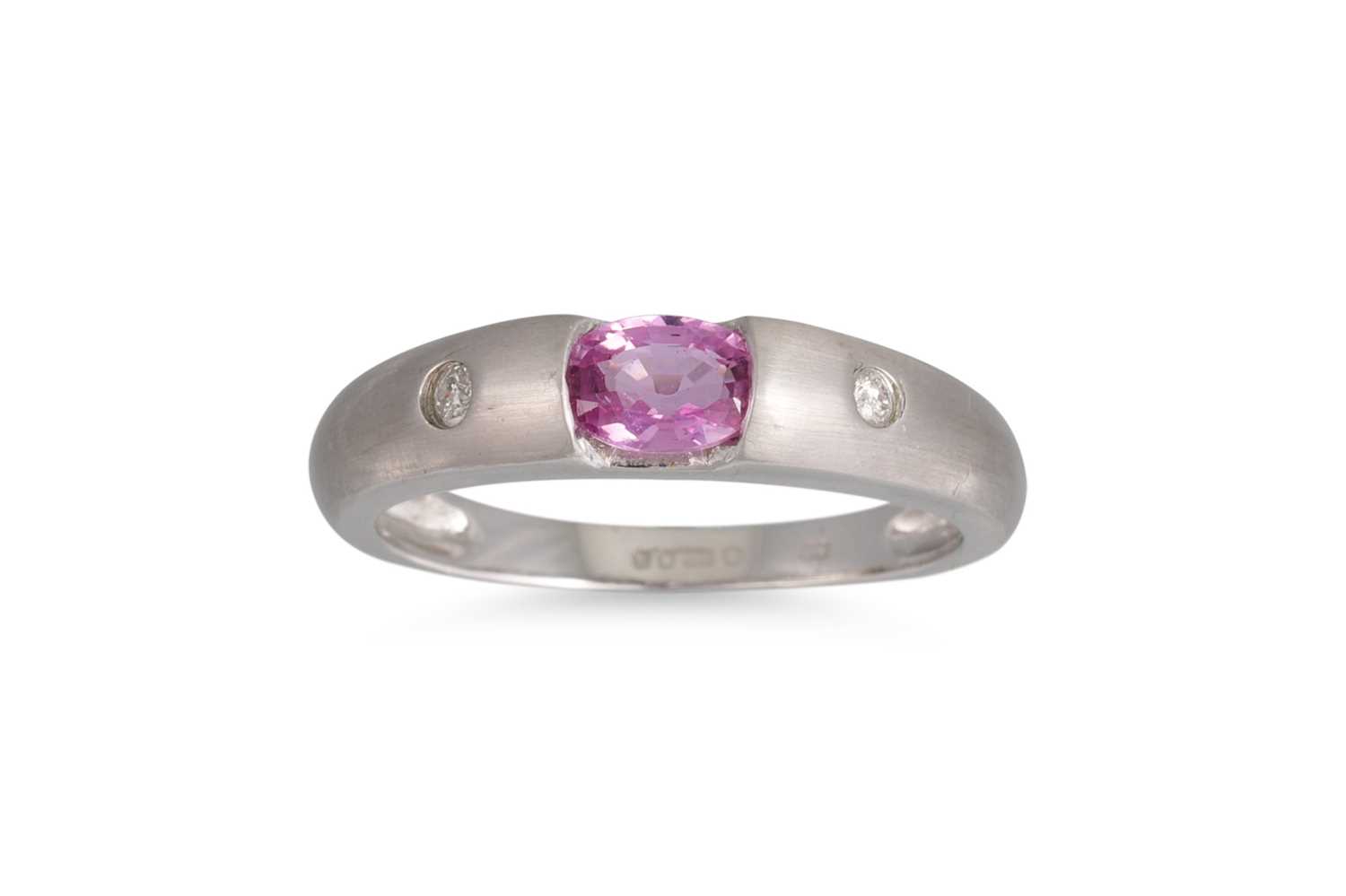 Lot 217 - A PINK SAPPHIRE AND DIAMOND RING, in brushed...