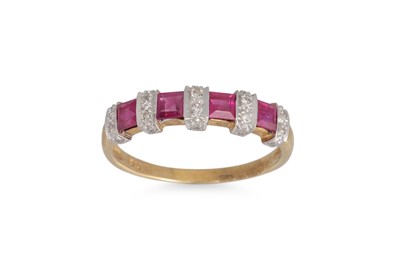 Lot 219 - A RUBY AND DIAMOND RING, mounted in 9ct yellow...
