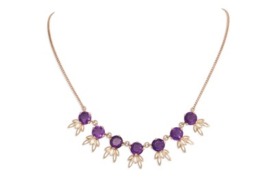 Lot 75 - AN AMETHYST FRINGE NECKLACE, the seven round...