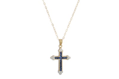 Lot 83 - A SAPPHIRE AND DIAMOND CROSS, mounted in...