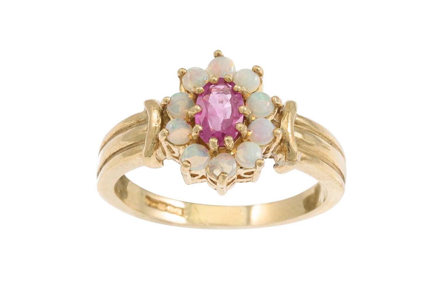 Lot 3 - A VINTAGE RUBY CLUSTER RING, mounted in gold,...