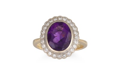 Lot 138 - A DIAMOND AND AMETHYST RING, the oval amethyst...