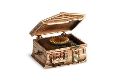 Lot 140 - A 9CT MUSICAL BOX CHARM, in the form of a...