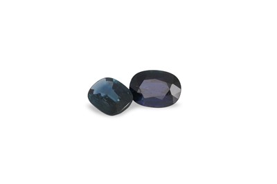 Lot 148 - TWO UNMOUNTED CUSHION CUT SAPPHIRES. weight of...