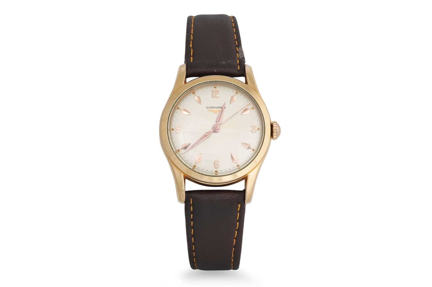 Lot 454 - A VINTAGE LONGINES WRISTWATCH, brown leather...