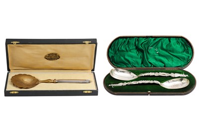 Lot 496 - A CASED SERVING SPOON, together with a cased...