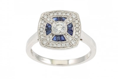 Lot 8 - A DIAMOND AND SAPPHIRE CLUSTER RING, of plaque...