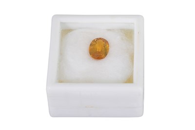 Lot 101 - AN UNMOUNTED OVAL FACETED YELLOW SAPPHIRE,...