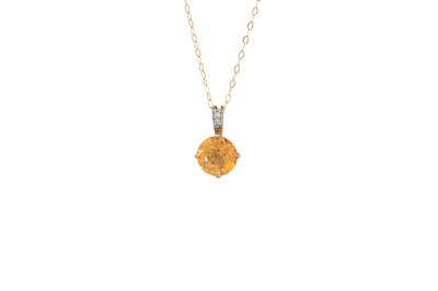 Lot 38 - A TOPAZ PENDANT, with diamond bail on a 9ct...