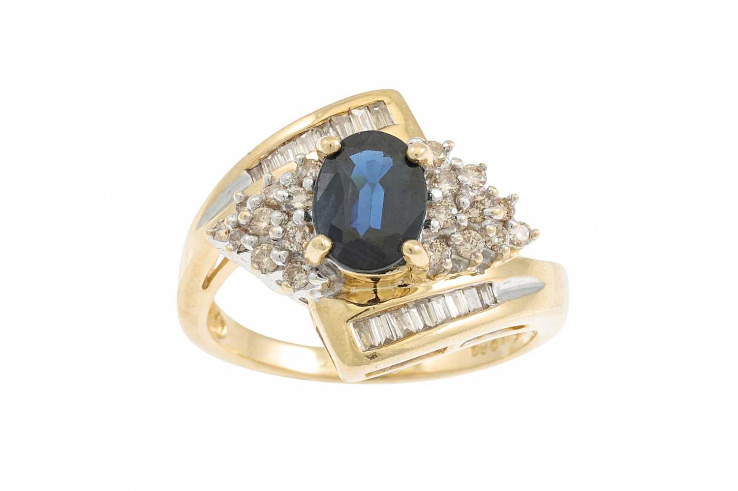 Lot 39 - A DIAMOND AND SAPPHIRE CLUSTER RING, of cross...