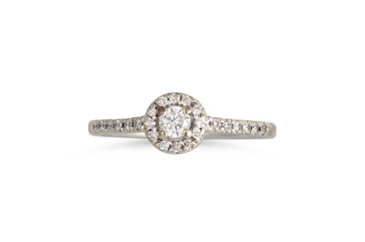 Lot 2 - A DIAMOND HALO CLUSTER RING, the centre...
