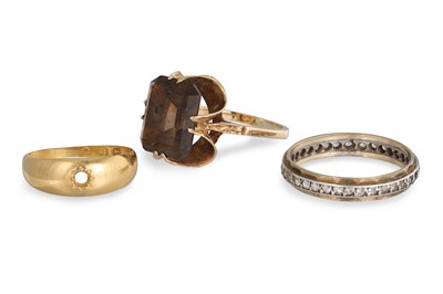 Lot 294 - THREE RINGS: to include a smoky quartz ring,...