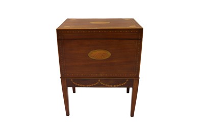 Lot 537 - A GEORGIAN INLAID MAHOGANY LIFT TOP CELLERETTE,...