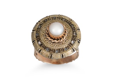 Lot 319 - A VINTAGE PEARL AND DIAMOND RING, of circular...