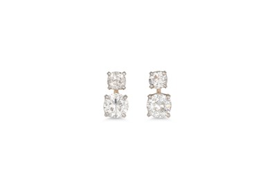Lot 383 - A PAIR OF DIAMOND EARRINGS, each set with a...