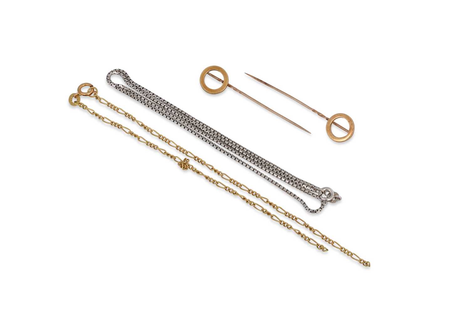 Lot 18 - TWO GOLD PINS, together with two gold chains,