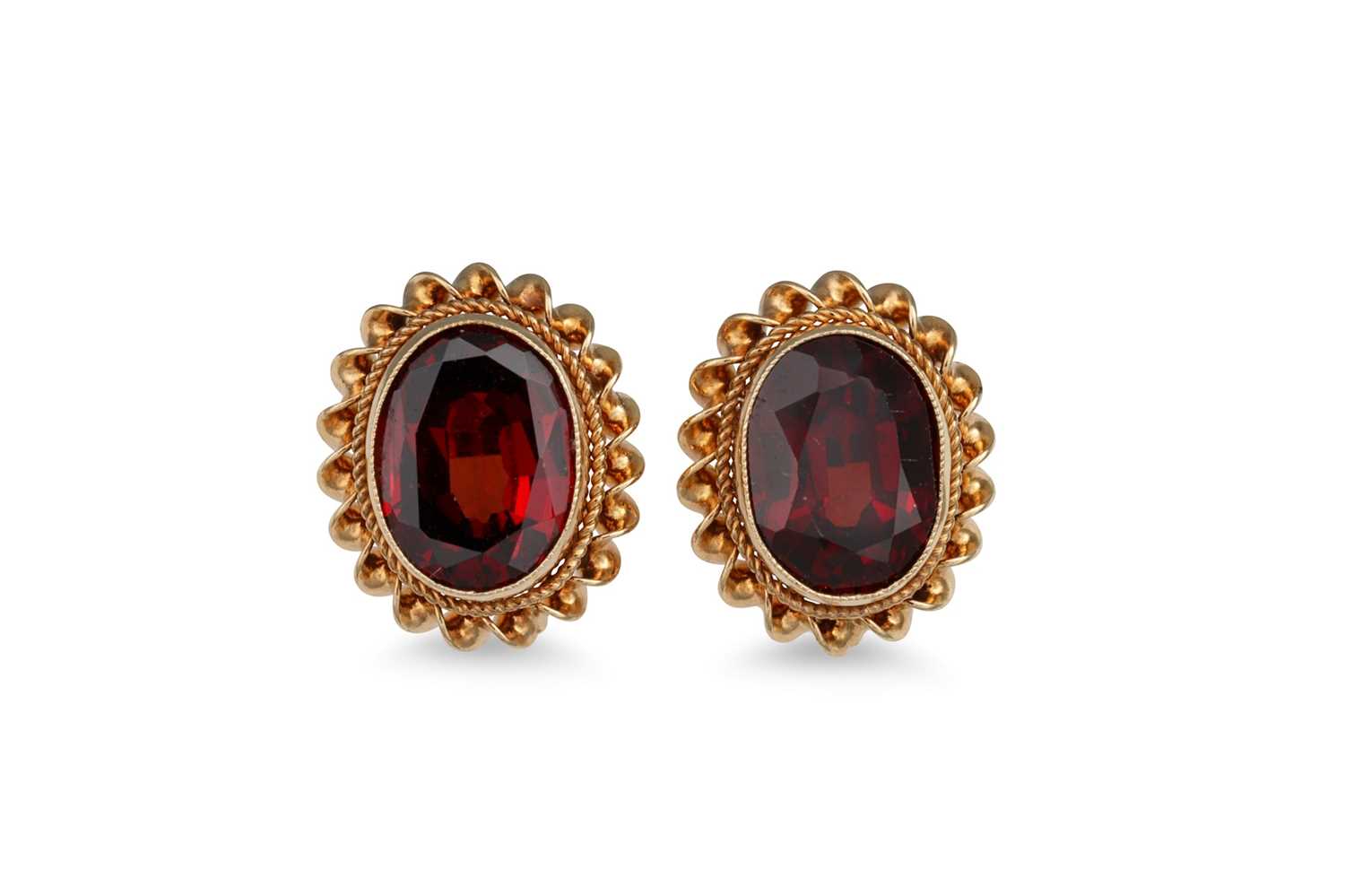 Lot 27 - A PAIR OF GARNET EARRINGS, the oval garnets to...