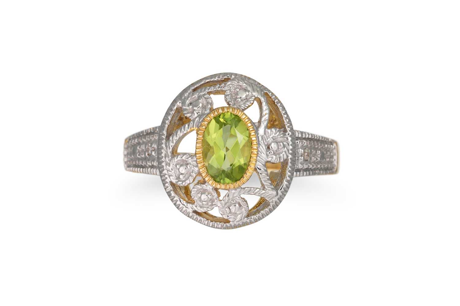 Lot 88 - A DIAMOND AND PERIDOT RING, mounted in 9ct...