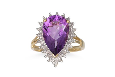 Lot 89 - A DIAMOND AND AMETHYST CLUSTER RING, the pear...