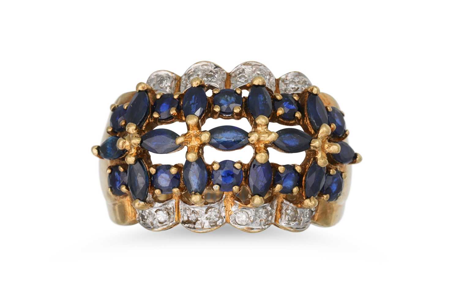 Lot 4 - A SAPPHIRE AND DIAMOND DRESS RING, the central...