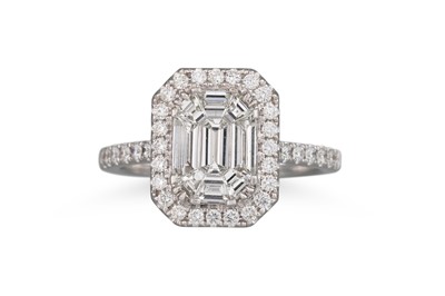 Lot 226 - A DIAMOND ILLUSION SET CLUSTER RING, set with...