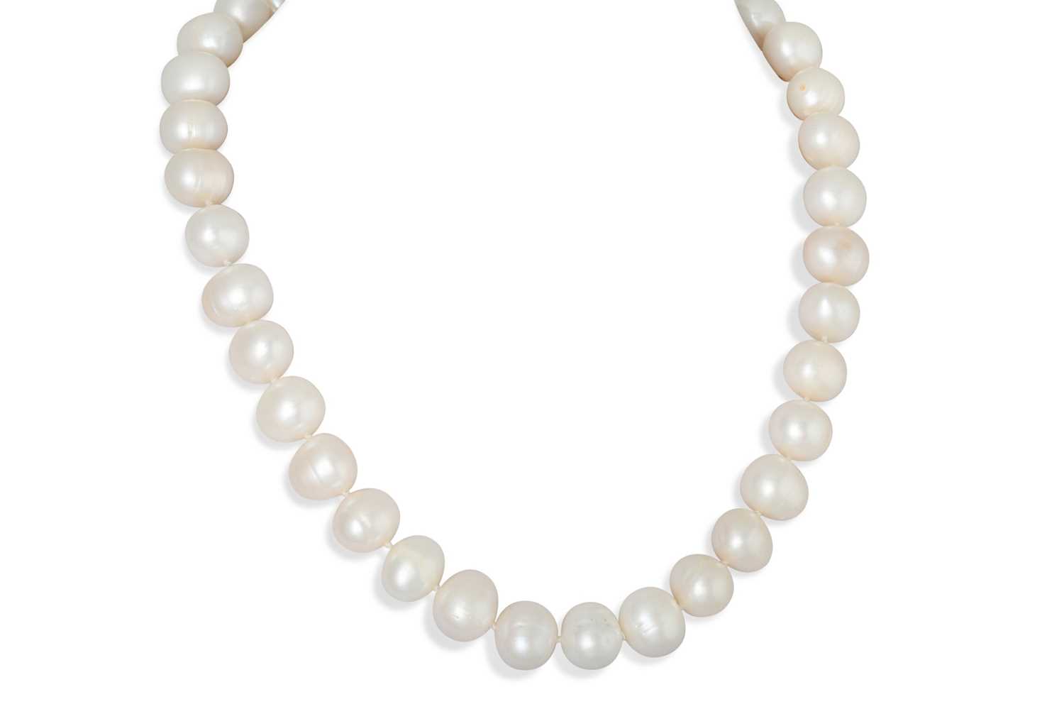 Lot 56 - A STRING OF RIVER PEARLS, with an 18ct yellow...