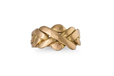 Lot 123 - A 14CT GOLD PUZZLE RING, size I, 5.3 g.
