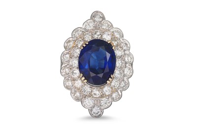 Lot 311 - A SAPPHIRE AND DIAMOND CLUSTER RING, the oval...