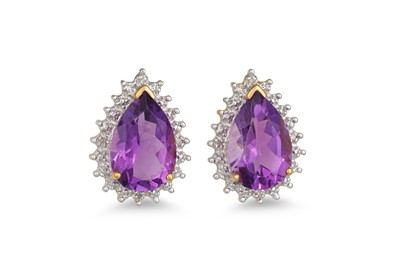 Lot 115 - A PAIR OF DIAMOND AND AMETHYST EARRINGS, the...