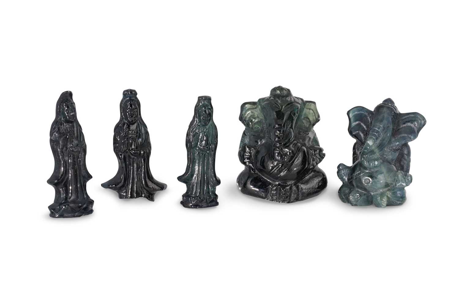 Lot 118 - FIVE CHINESE CARVED SAPPHIRE FIGURES, greenish...
