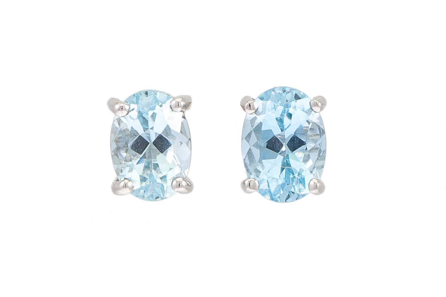 Lot 144 - A PAIR OF AQUAMARINE EARRINGS, mounted in...