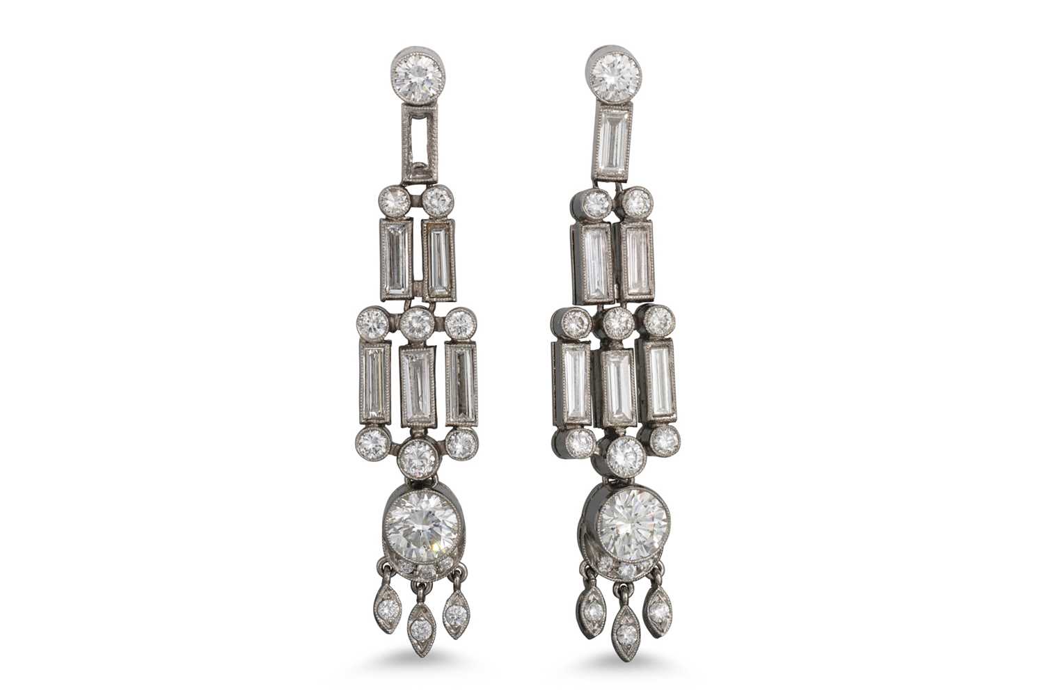 Lot 370 - A PAIR OF DIAMOND DROP EARRINGS, set with...
