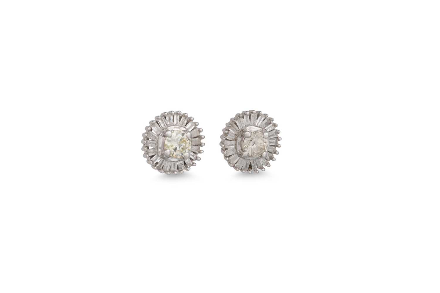 Lot 174 - A PAIR OF DIAMOND CLUSTER EARRINGS, set with...