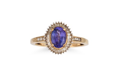 Lot 180 - A TANZANITE AND DIAMOND CLUSTER RING, the oval...