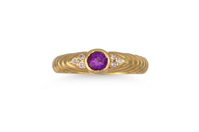 Lot 184 - AN AMETHYST AND DIAMOND RING, to a fluted 18ct...
