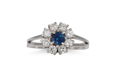 Lot 396 - A SAPPHIRE AND DIAMOND CLUSTER RING, of...