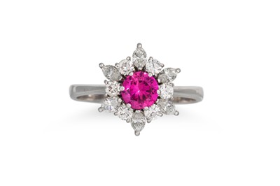 Lot 398 - A RUBY AND DIAMOND CLUSTER RING, the circular...