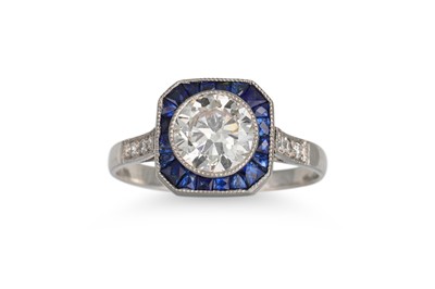 Lot 453 - A DIAMOND AND SAPPHIRE RING, the circular...