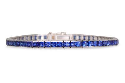 Lot 455 - A SAPPHIRE LINE BRACELET, the French cut...