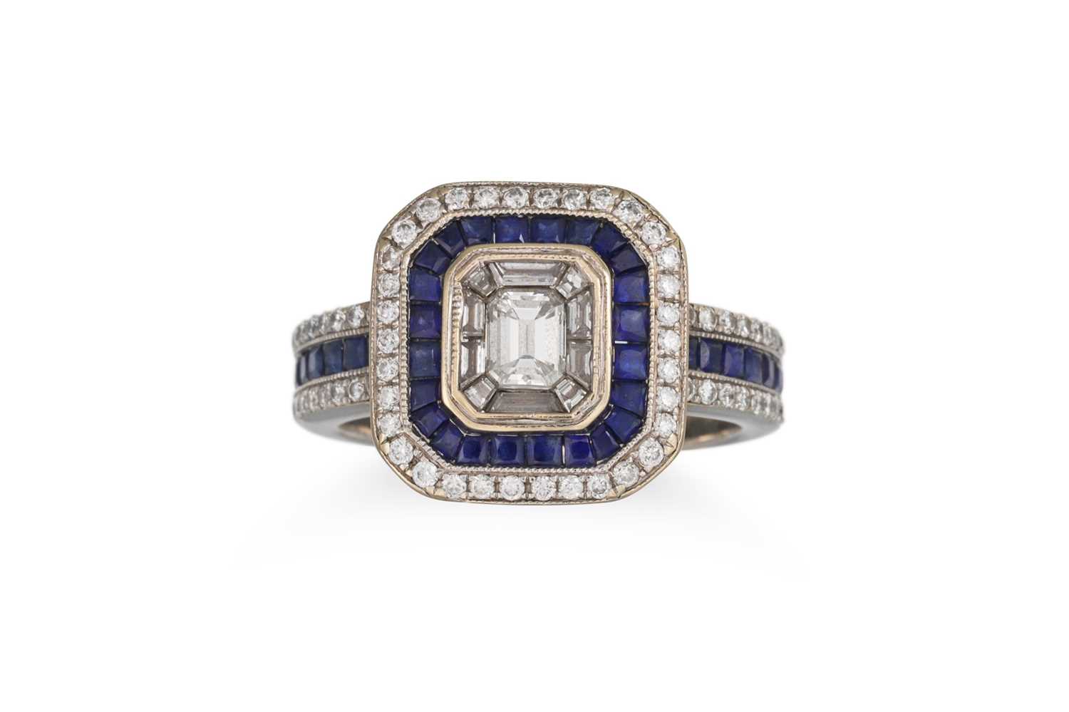 Lot 27 - A DIAMOND AND SAPPHIRE CLUSTER RING, set with...