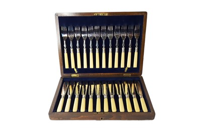 Lot 533 - A CASED EDWARDIAN SET OF TWELVE E.P.N.S. BONE...