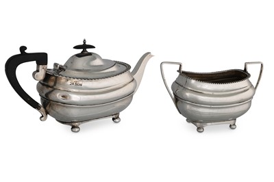 Lot 508 - A GEORGE V SILVER TEAPOT, with egg & dart...