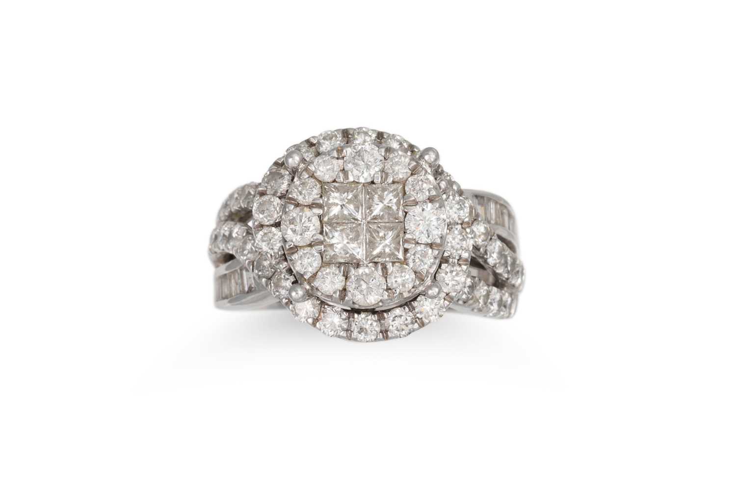Lot 237 - A DIAMOND CLUSTER RING, set with circular &...