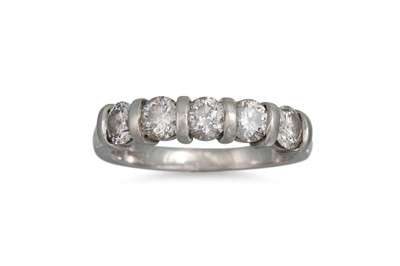 Lot 345 - A DIAMOND FIVE STONE RING, mounted in platinum....