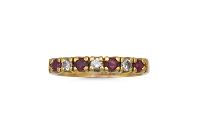 Lot 139 - A RUBY AND DIAMOND SET RING, mounted in 18ct...