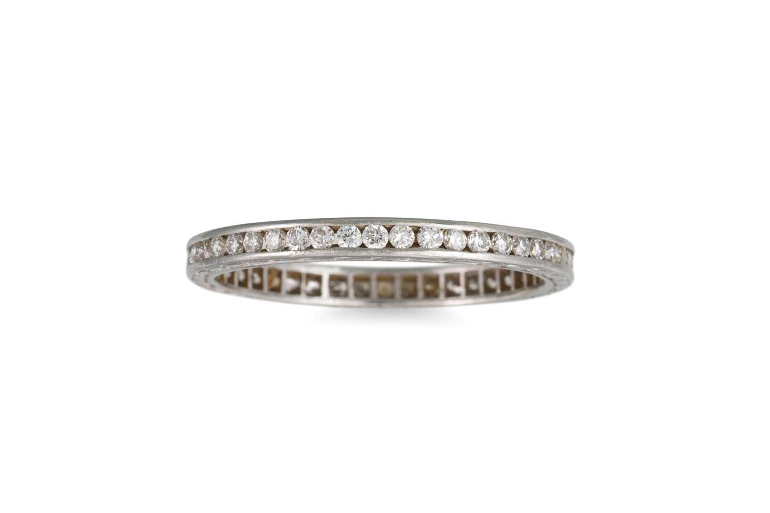 Lot 72 - A DIAMOND FULL BANDED ETERNITY RING, engraved...