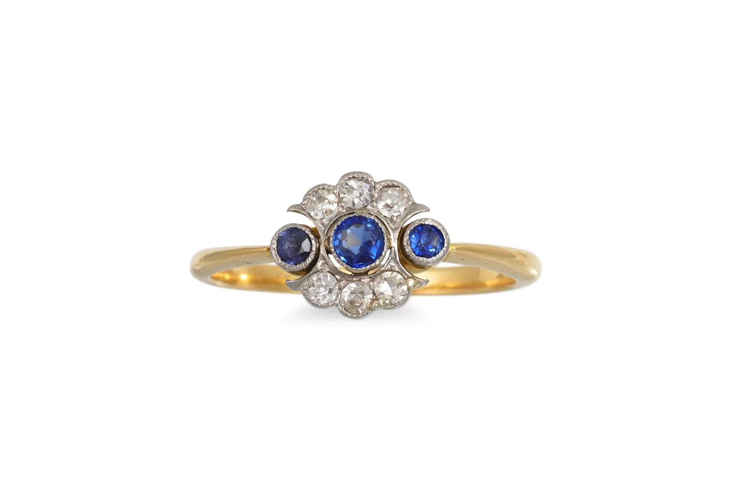 Lot 75 - A SAPPHIRE & DIAMOND CLUSTER RING, mounted in...