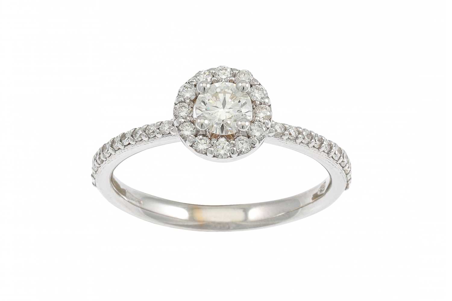 Lot 193 - A DIAMOND 'HALO' CLUSTER RING, the brilliant...